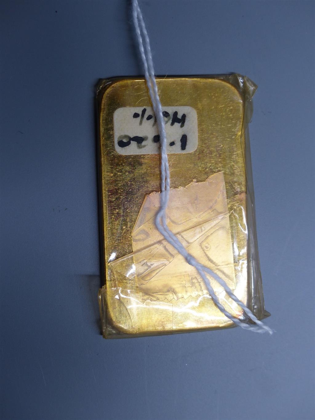 A Swiss Argor S.A. Chiasso 1000 yellow metal ingot, numbered 4577,